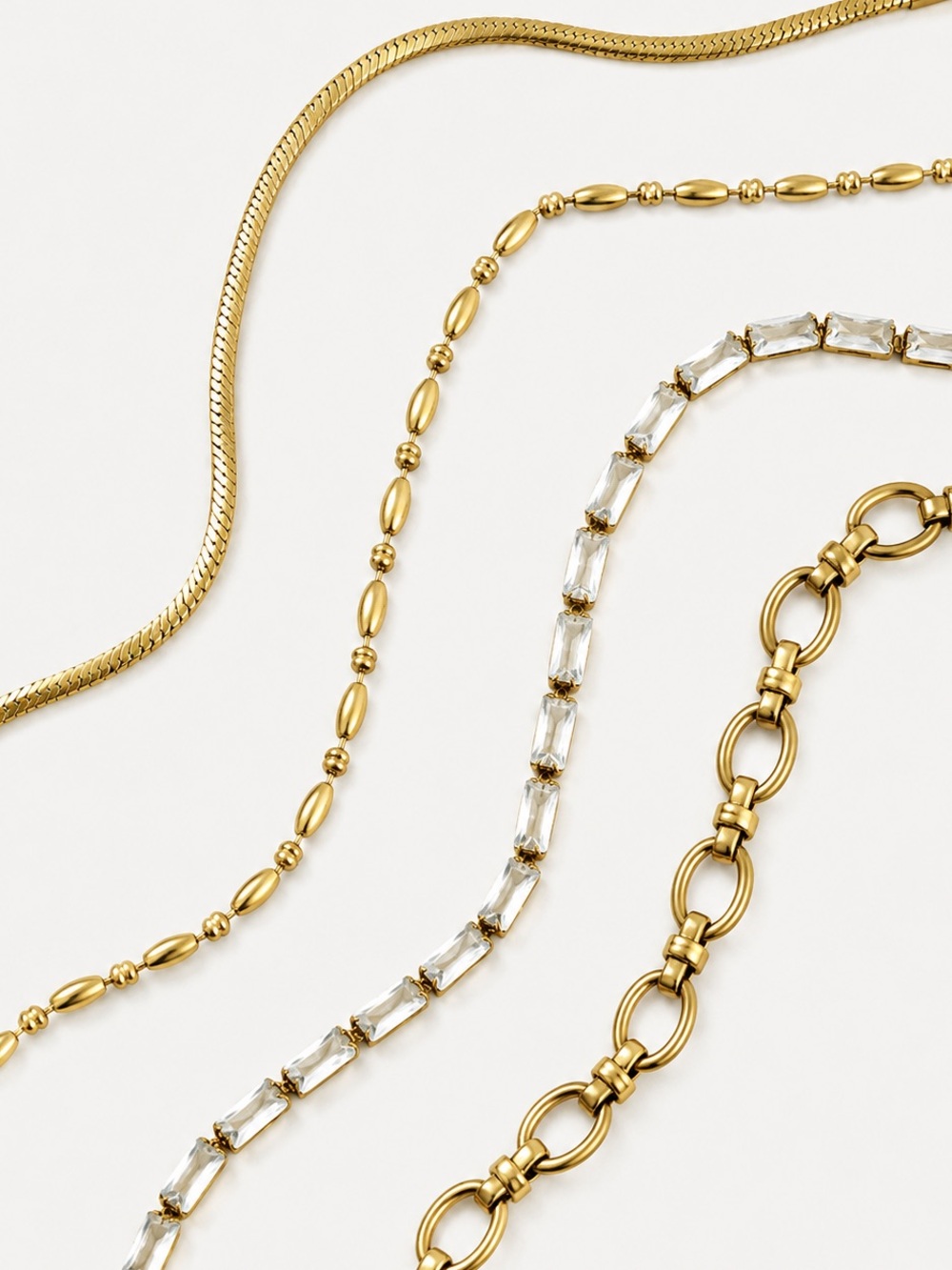 Think Freely Essential Gold Bracelet Stack | 4 Piece Waterproof Minimalist Set